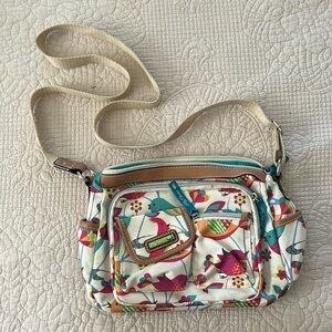 Women’s cute purse with adjustable strap. Bird print. Good condition.